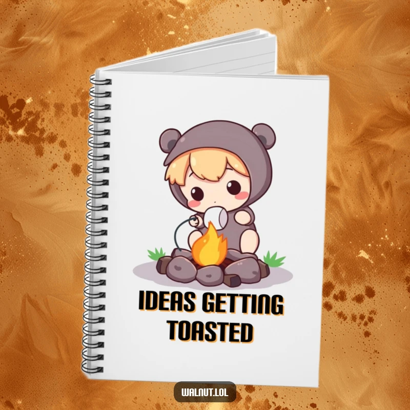 Funny Notebook with a cute character roasting a marshmallow over a tiny campfire, ideal for jotting down outdoor adventures.